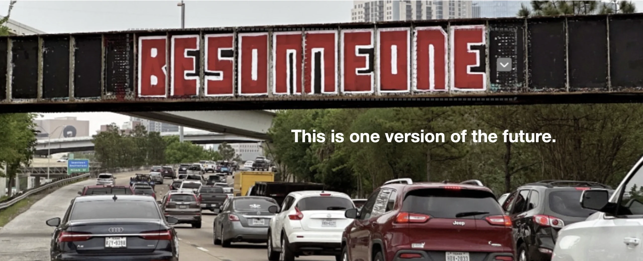 Houston highway overpass BE SOMEONE graffiti — This is one version of the future